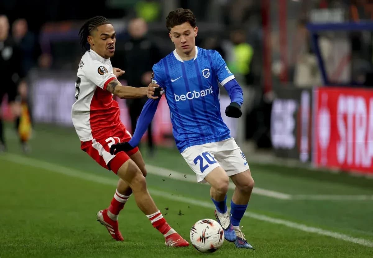 Two players contesting the ball during a match