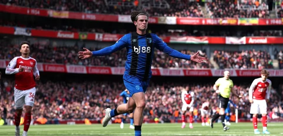 Bournemouth player celebrating goal against Arsenal