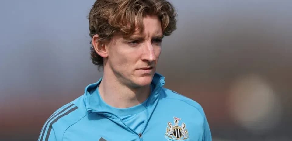Newcastle player in training gear on pitch