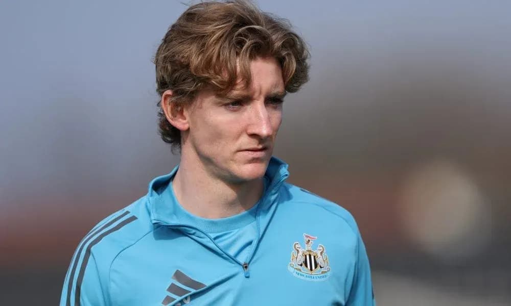 Newcastle player in training gear on pitch