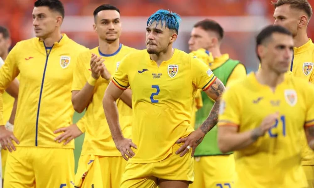 Romanian football team in yellow jerseys after match