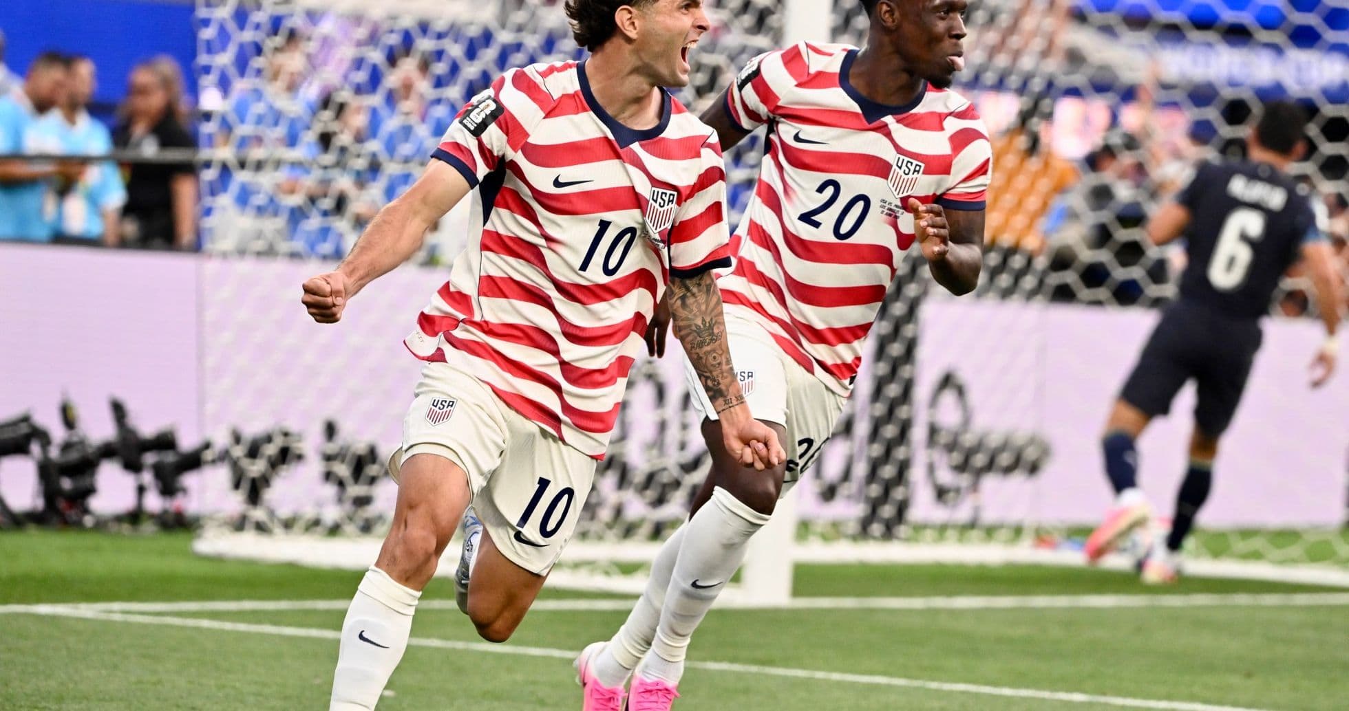 USA players celebrating a goal in World Cup match