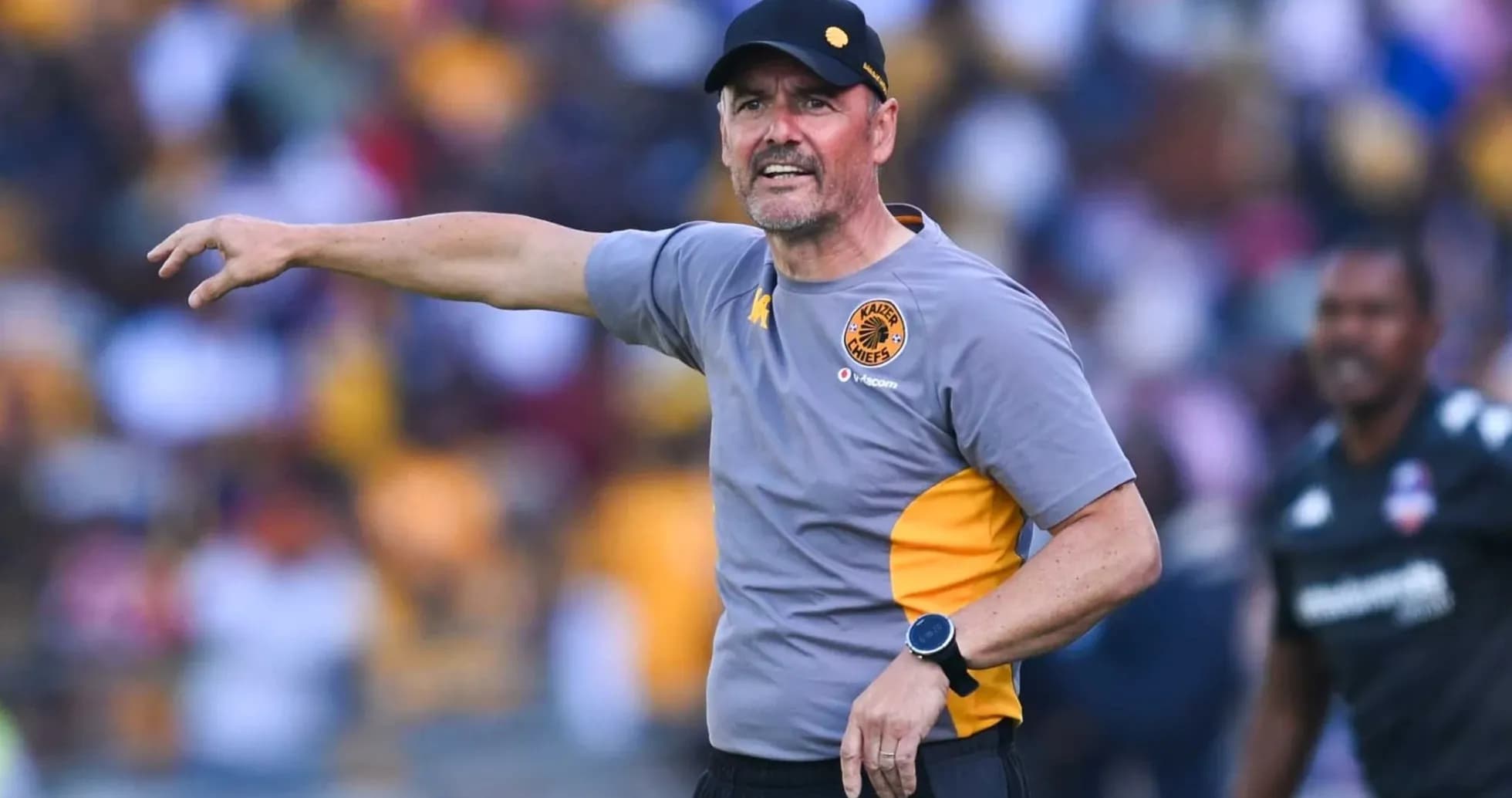 Kaiser Chiefs coach directing players during match