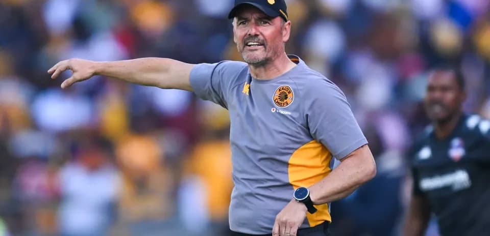 Kaiser Chiefs coach directing players during match