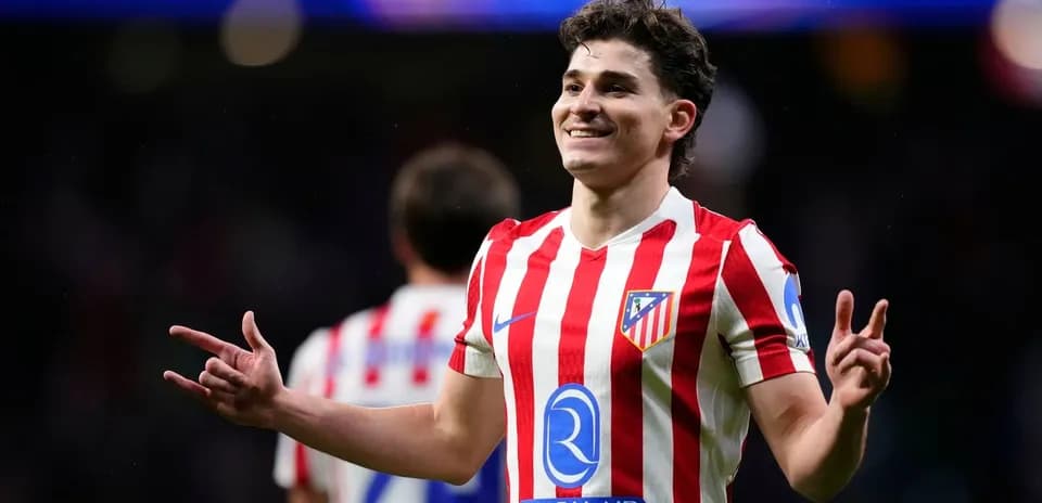 Atletico Madrid player celebrating after scoring goal