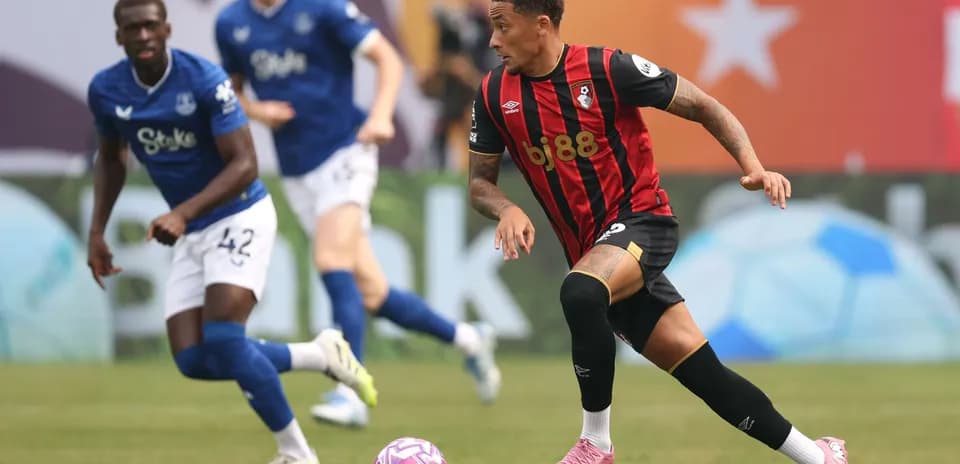 Bournemouth player dribbling the ball during match