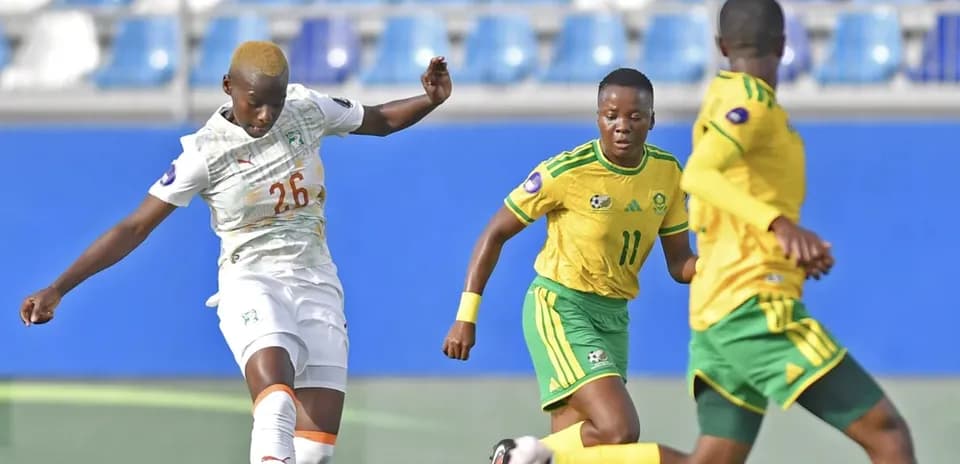 Player 26 from Ivory Coast kicking the ball