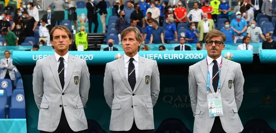 Coaching staff in suits at UEFA Euro 2020