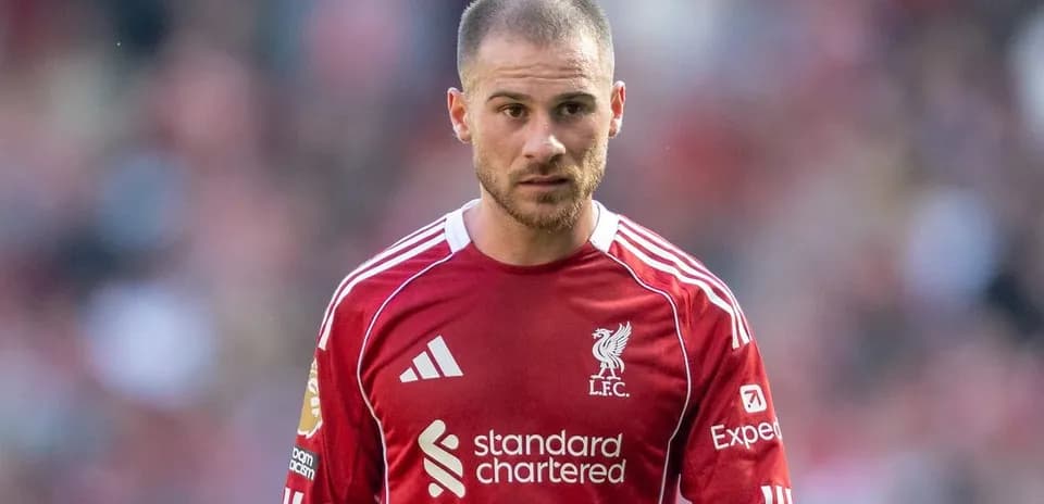 Player wearing Liverpool jersey on the field