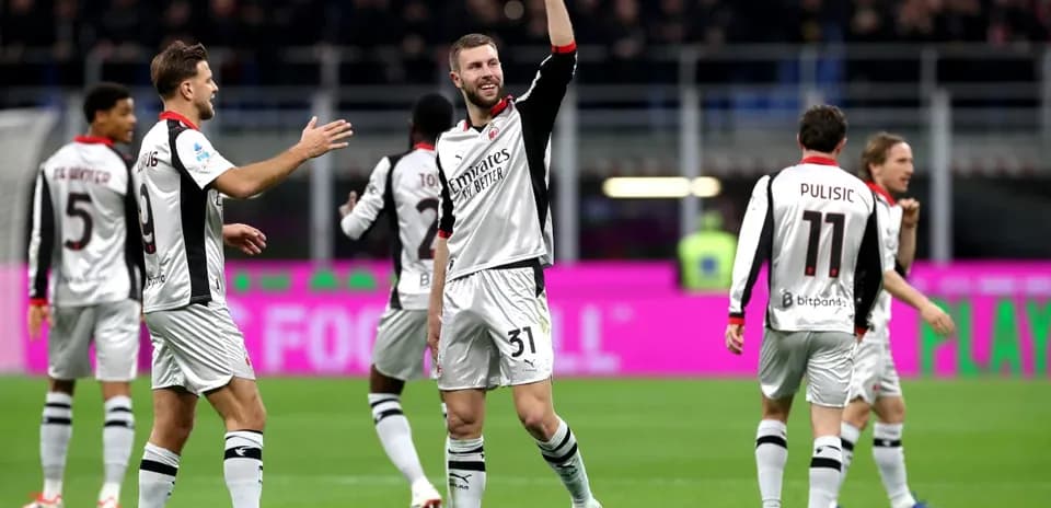 AC Milan players celebrating during Serie A match