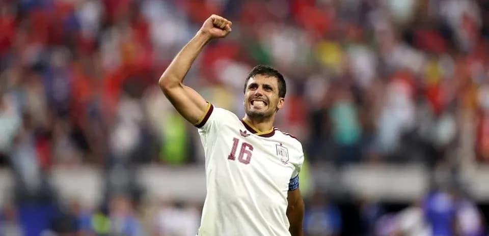 Player celebrating victory with raised fist