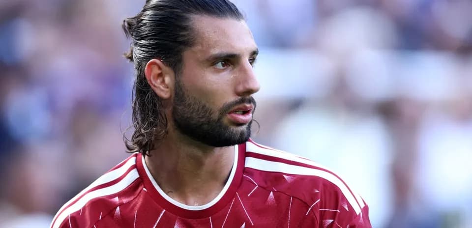 Player in red jersey during match close-up