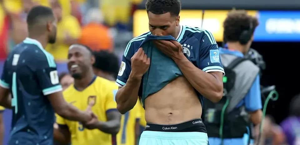 German player reacting after a match loss