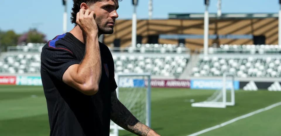 Player walking on training field before match