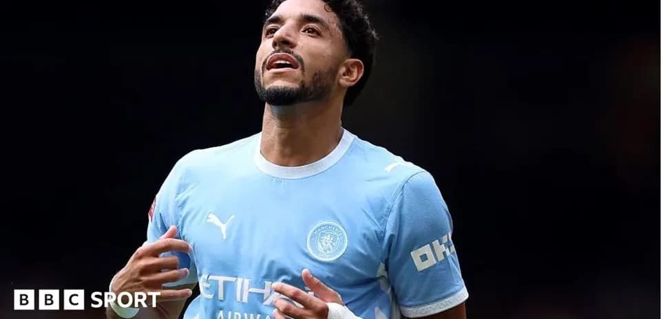 Player celebrating after scoring a goal for Manchester City