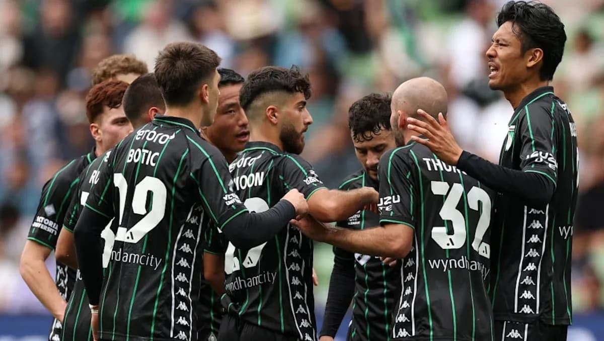 Players celebrating a goal during a match