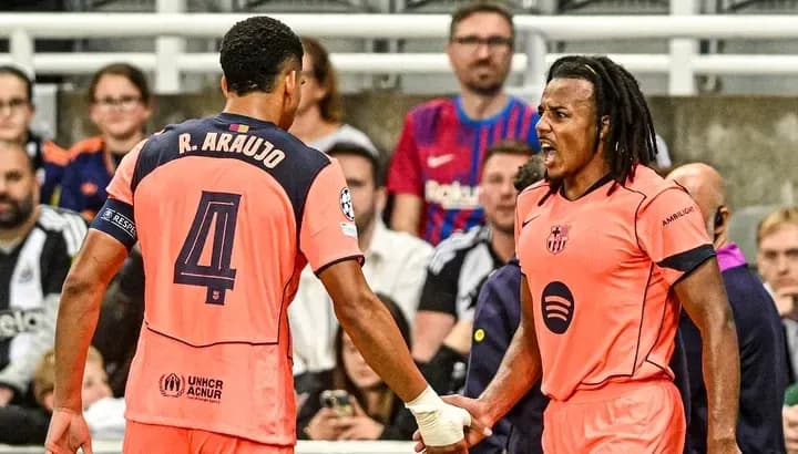 Two players celebrating during a football match