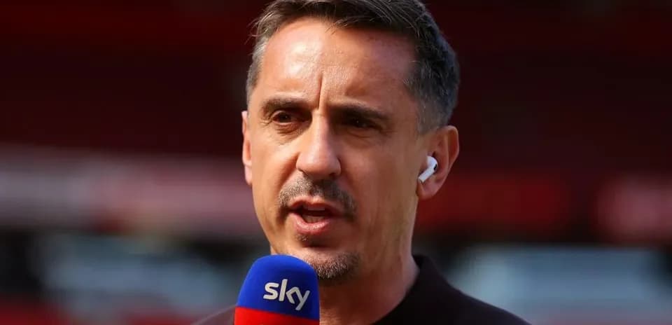 Sportscaster speaking into microphone during broadcast