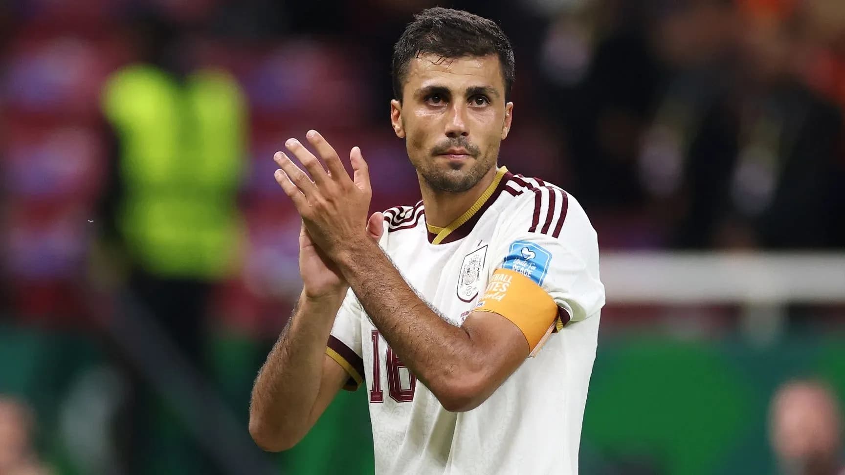 Player applauding fans after the match