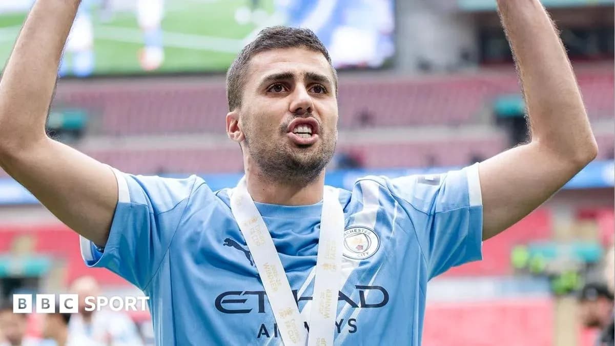 Player celebrating with medal after match victory