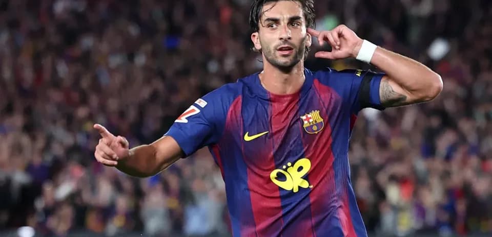 Player celebrating a goal during match at Camp Nou