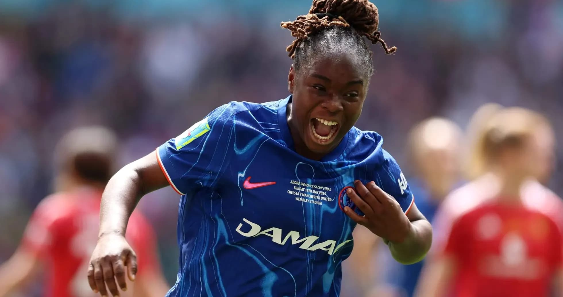 Chelsea player celebrating during match against Manchester United
