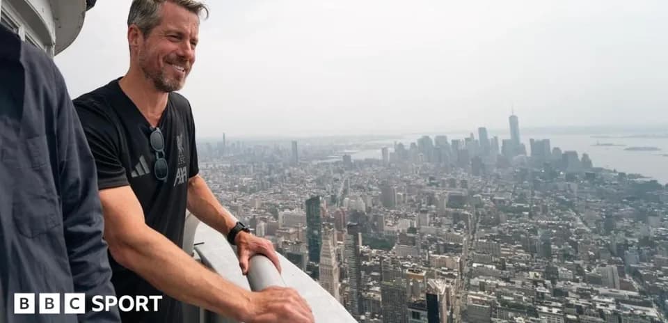 Person overlooking New York City from high viewpoint