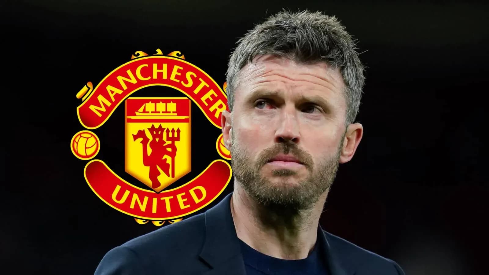 Manchester United logo behind a man in a suit