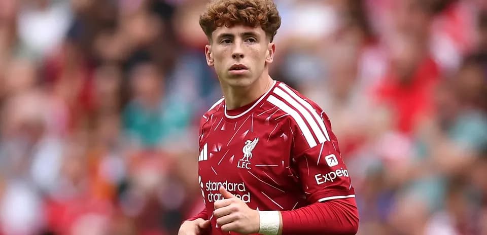 Player in Liverpool kit during match action