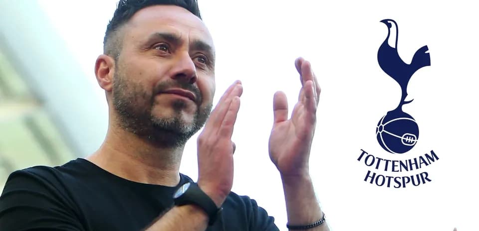 Manager applauding fans with Tottenham Hotspur logo