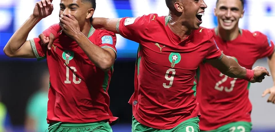 Moroccan players celebrating a goal during match