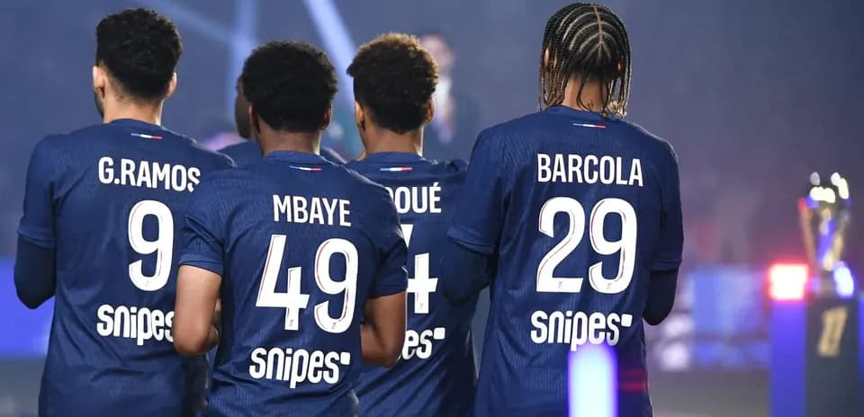 Four players in jerseys with names and numbers visible