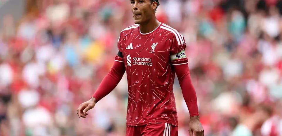 Virgil van Dijk walking on the pitch during match