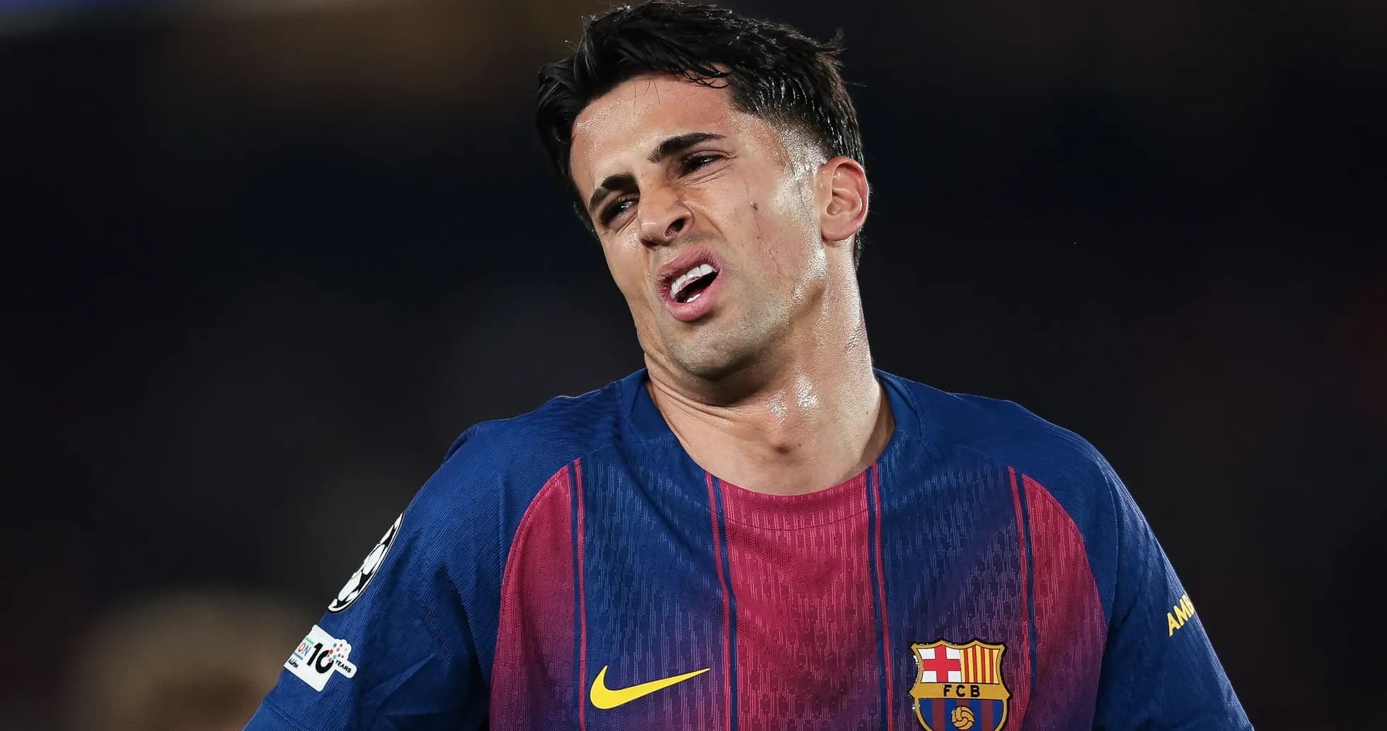 Barcelona player expressing frustration on the field