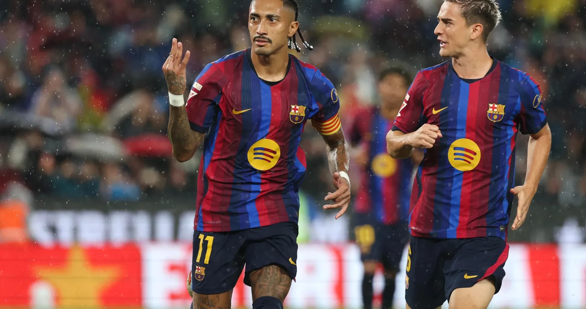 Barcelona players celebrating a goal in La Liga