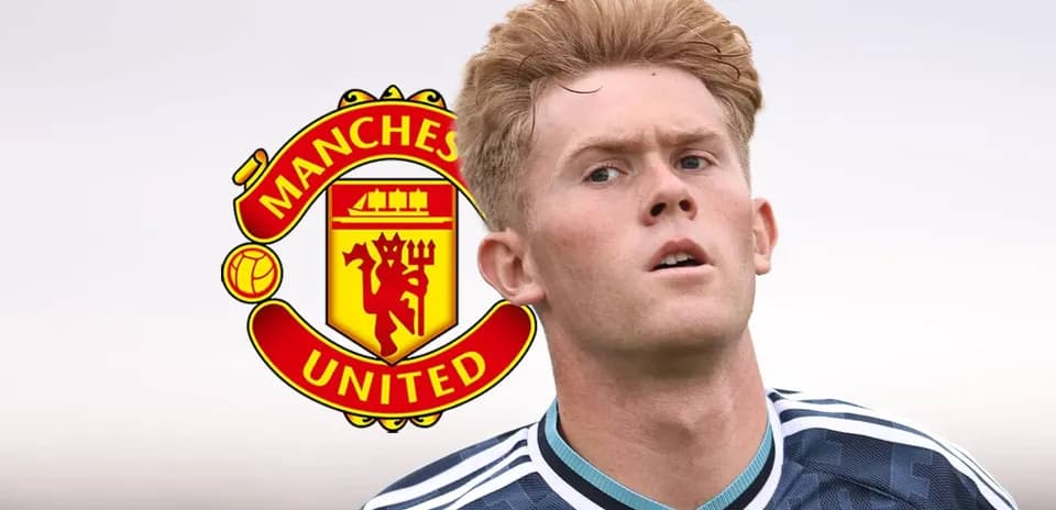 Player in Manchester United kit against club logo