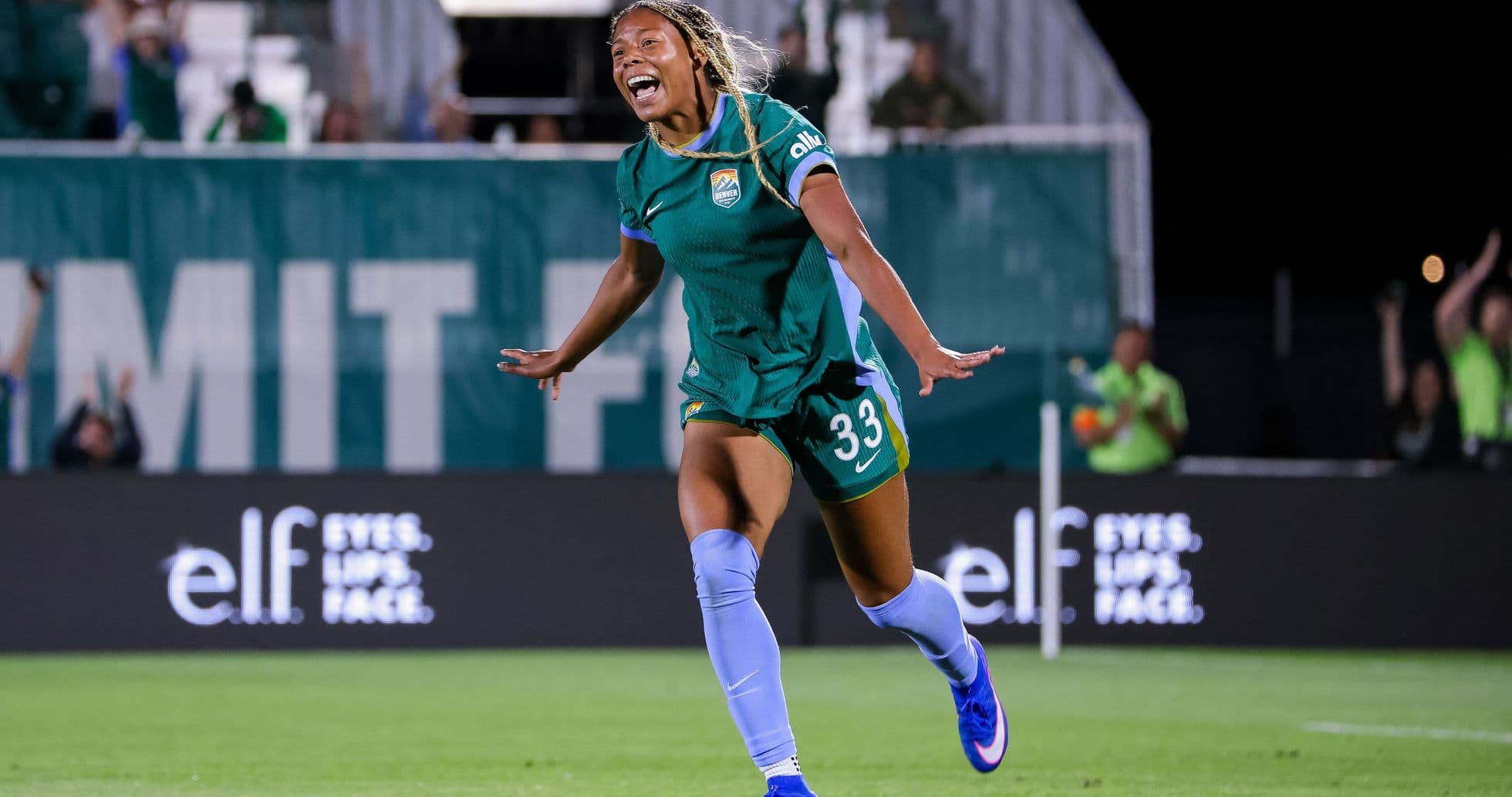 Player celebrating after scoring a goal during match