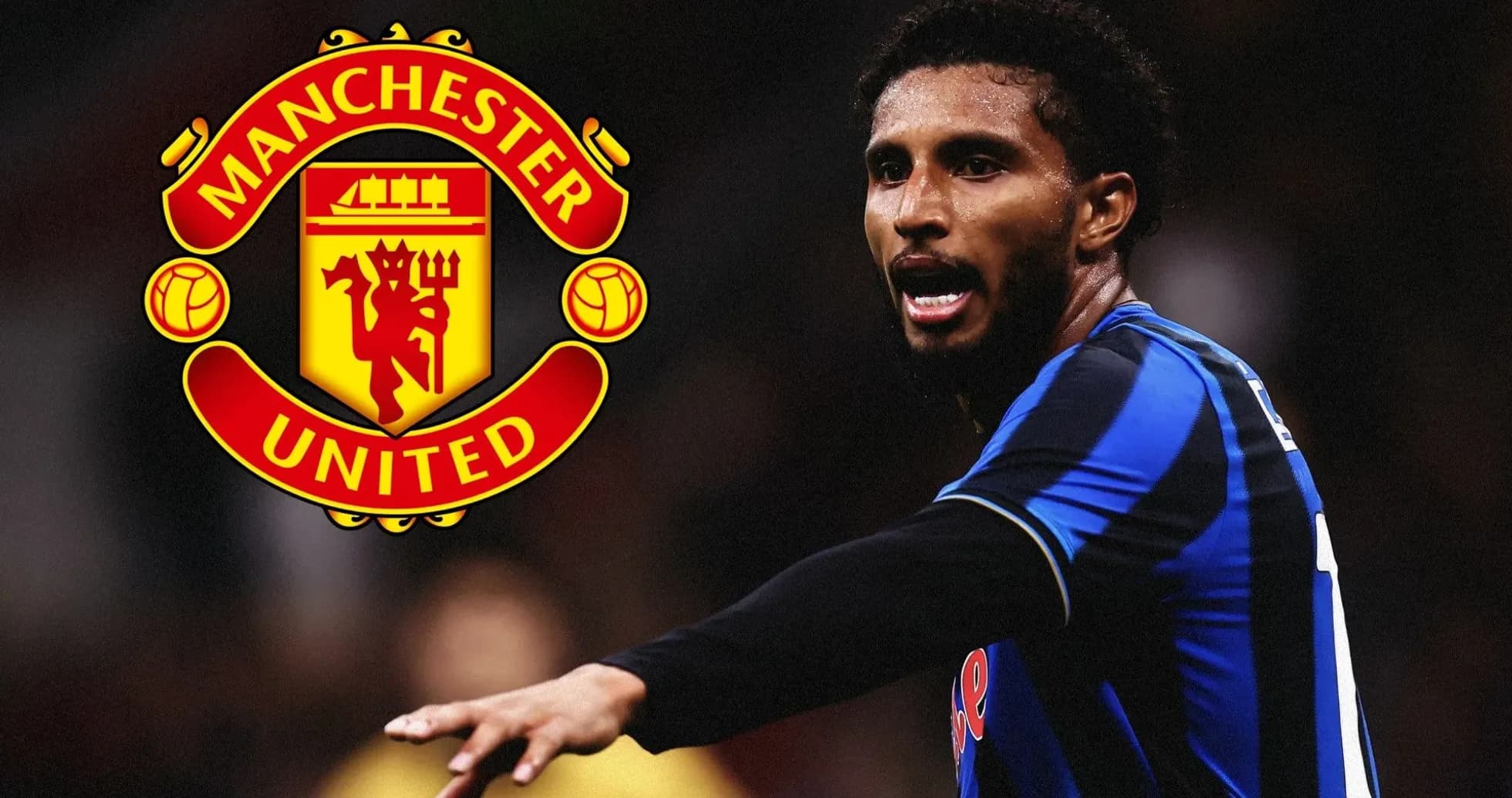 Player gesturing on field with Manchester United logo