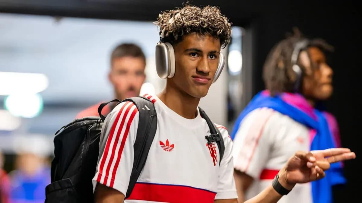 Player wearing headphones entering the venue