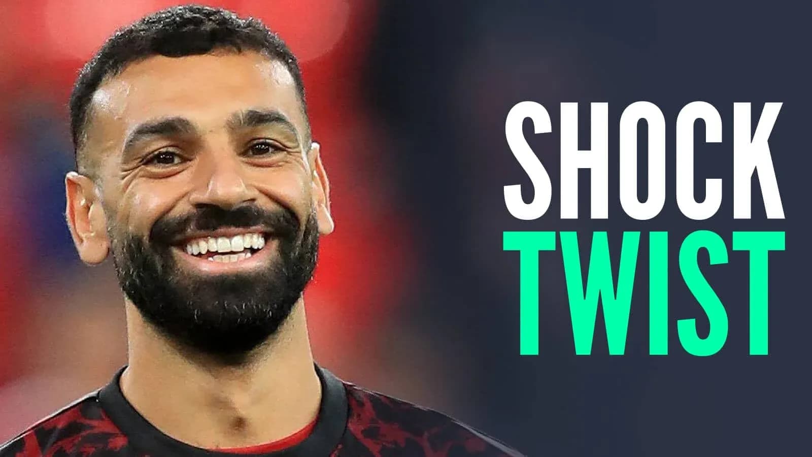 Smiling football player in red jersey on field