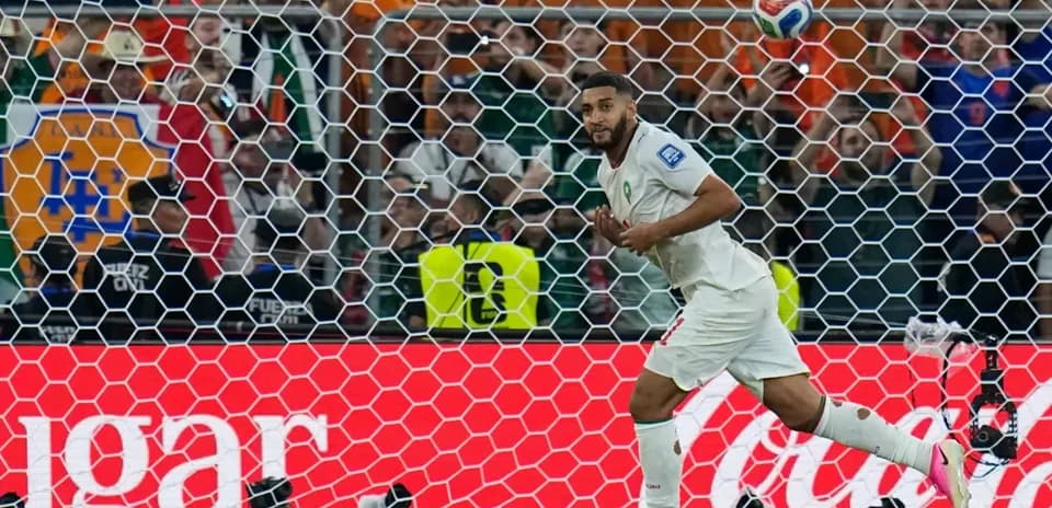Moroccan player celebrating a goal in World Cup match