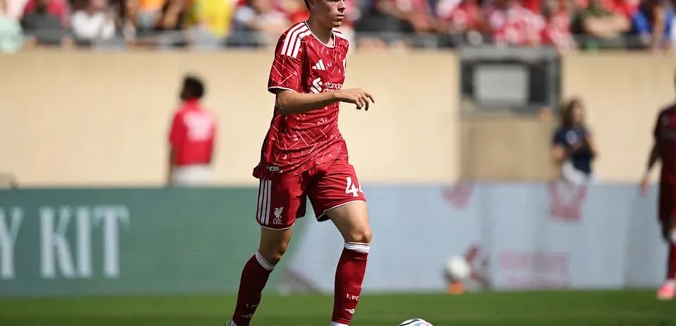 Liverpool player in red kit on the field