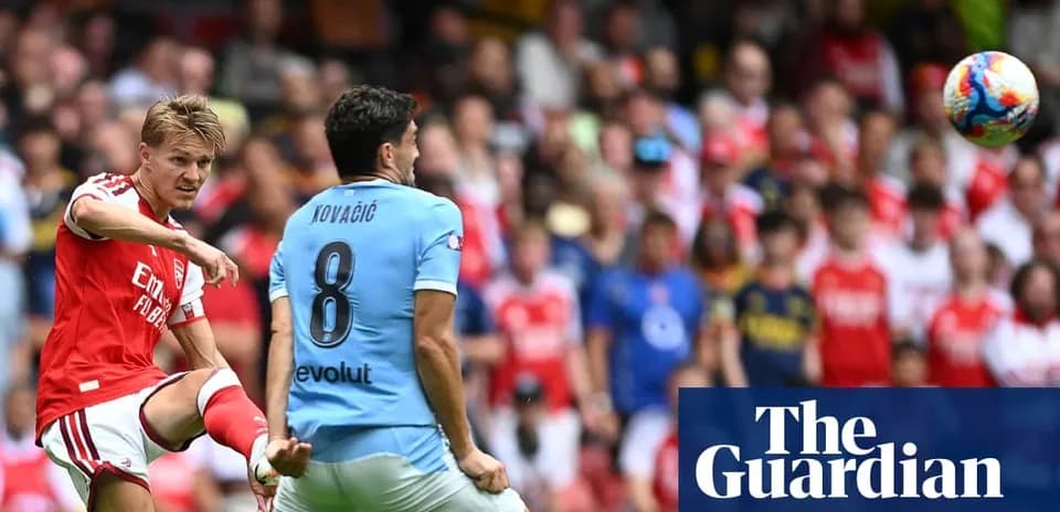 Player kicking ball during match between Arsenal and Manchester City