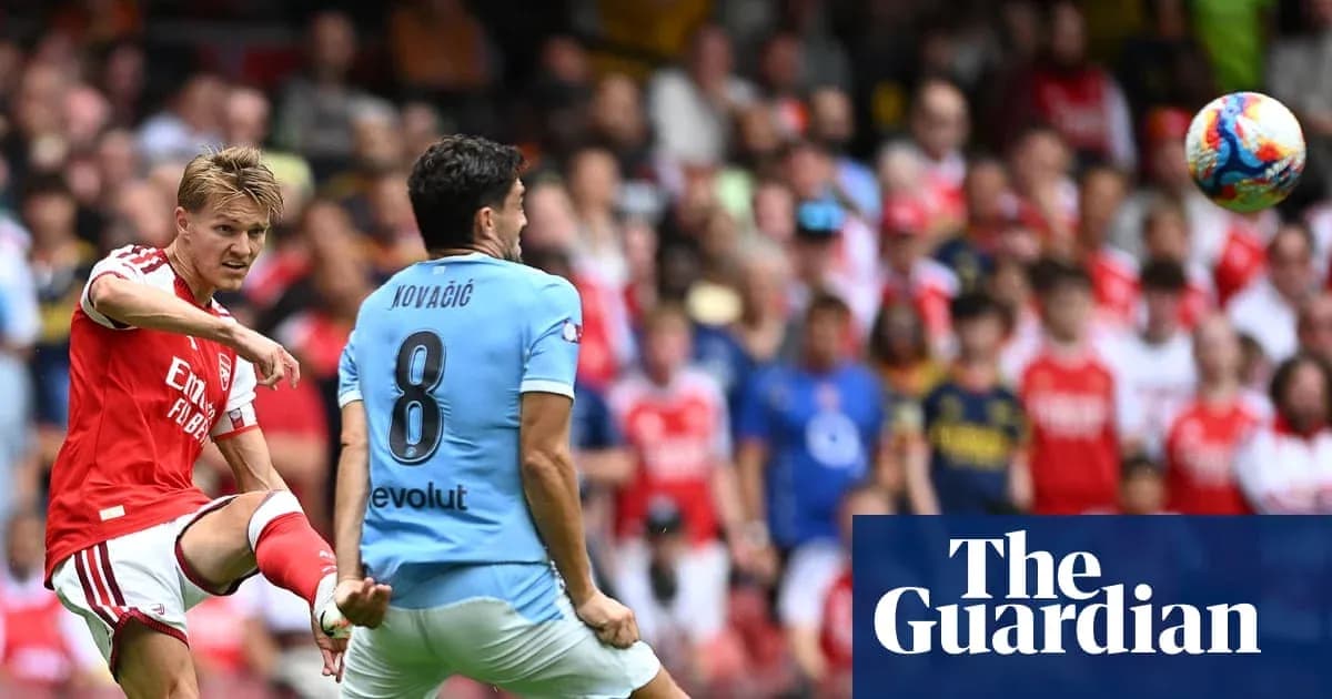 Player kicking ball during match between Arsenal and Manchester City