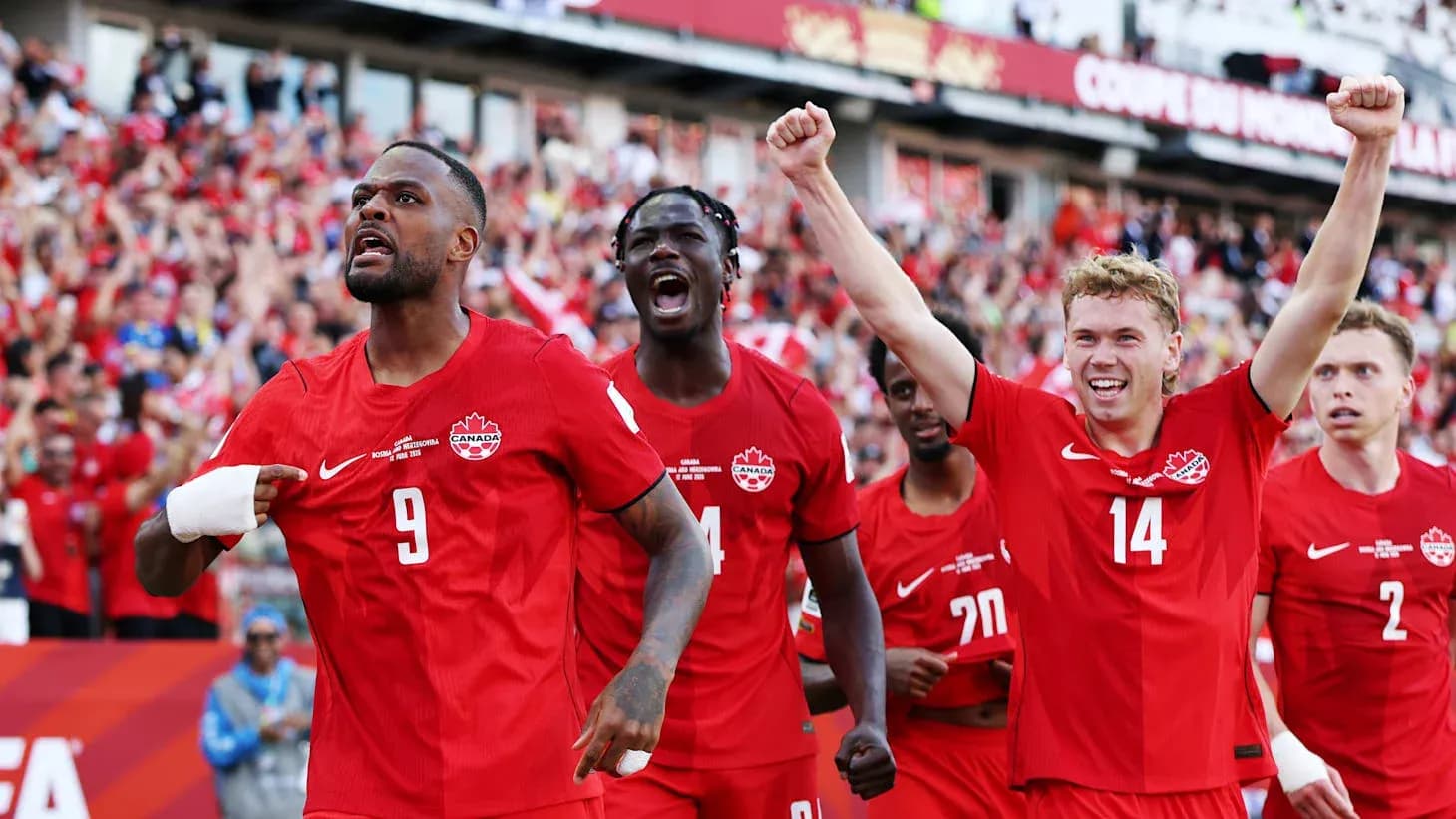 Canadian players celebrating a goal during match
