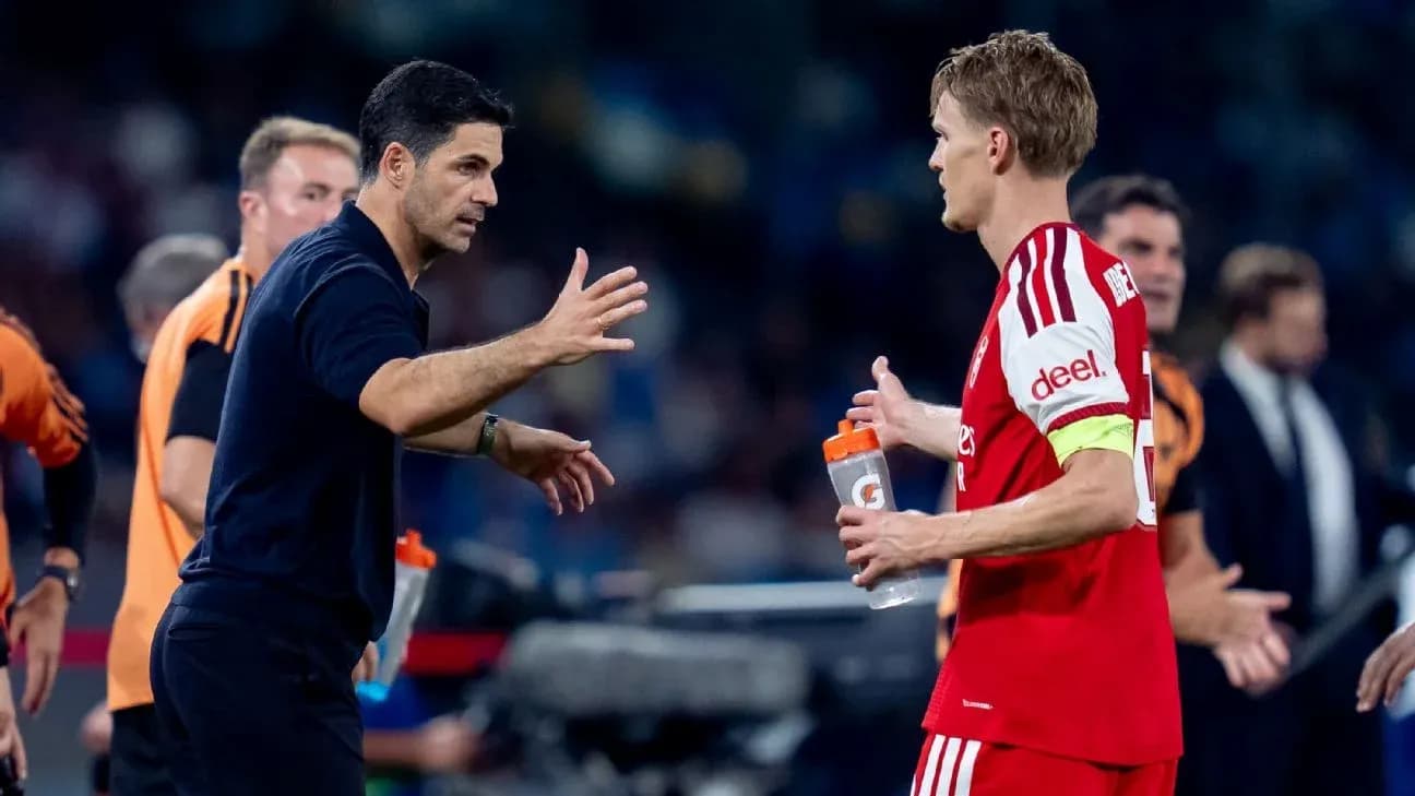 Coach discussing strategy with player during match