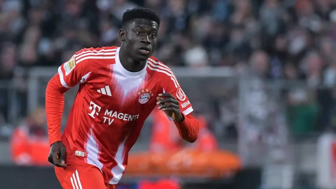 Player running on the pitch in Bayern Munich kit