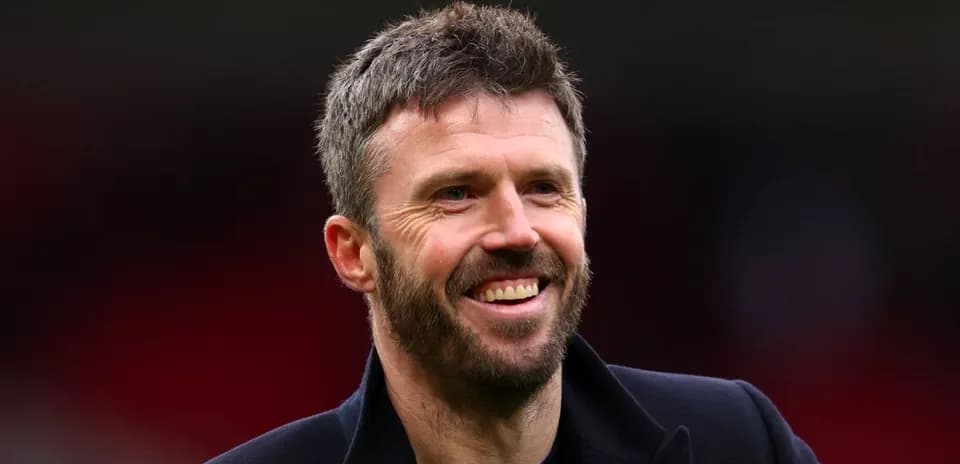 Man smiling during a football match event