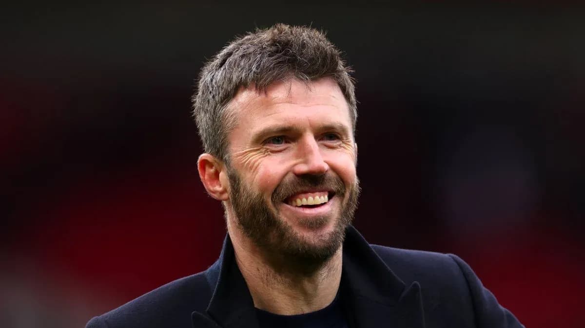 Man smiling during a football match event