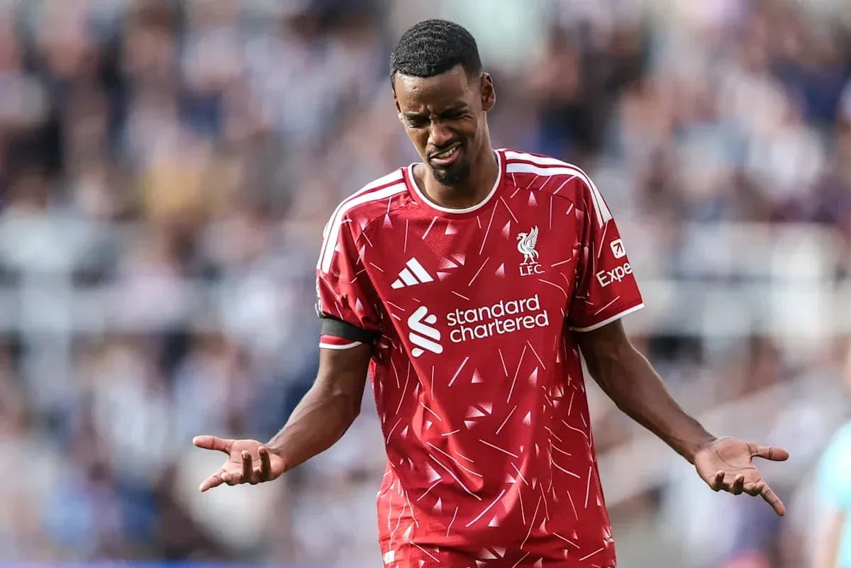Liverpool player expressing frustration on the field